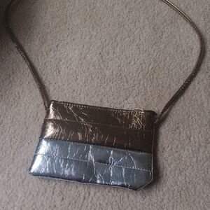 Metallic Gold and Silver Crossbody Bag And Blue White And Green Striped bag.